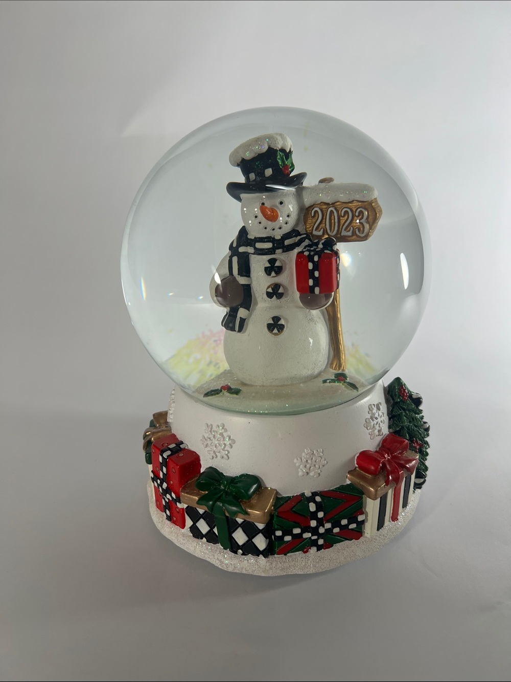 MacKenzie-Childs White Snowman 2023 Snow Globe with Red & Green Accents